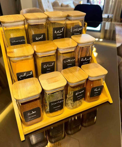 عدد 12 برطمانات  توابل اكليرك مقاس 250مل ومعاهم سلم خشب مستورد وكمان معاهم هديه استيكرات توابل وعدد 12 معلقه جروف