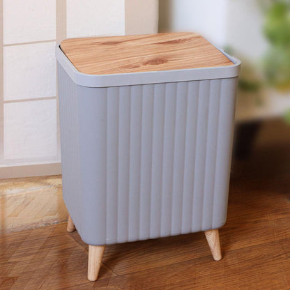 سلة مهملات ديكورية بغطاء وأرجل خشبية متعددة الاستخدام