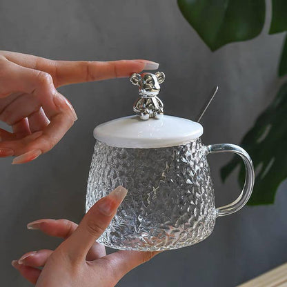 مج بابلز زجاج بايركس بغطاء ومعلقة – تصميم كيوت دبدوب | مج عصري للمشروبات الساخنة والباردة