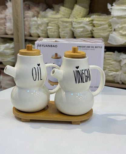 طقم زيت وخل بورسلين بغطاء خشب + قاعدة خشبية أنيقة (قطعتين) 😍