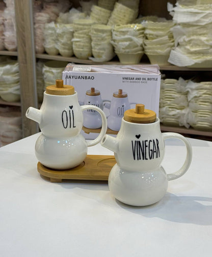 طقم زيت وخل بورسلين بغطاء خشب + قاعدة خشبية أنيقة (قطعتين) 😍
